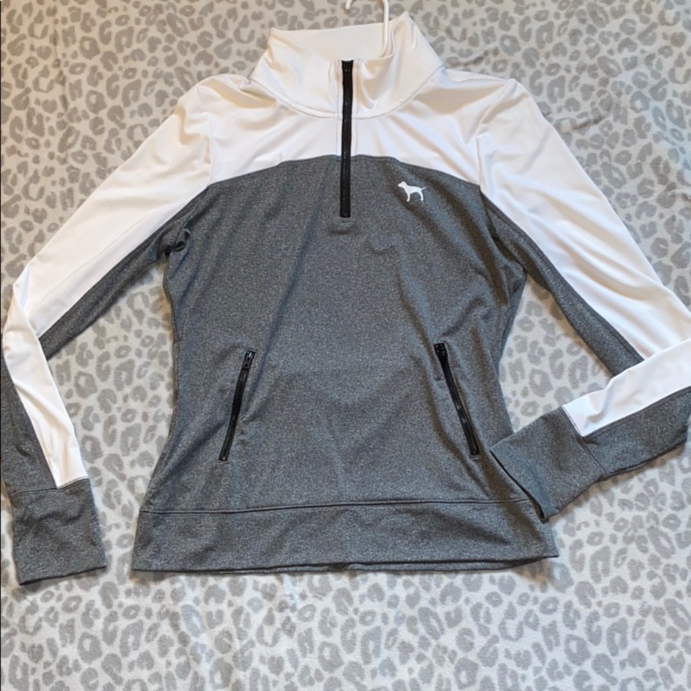 PINK pullover.